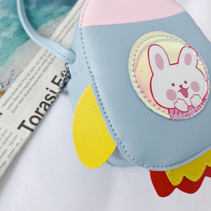 2021 Summer New Children's bag, candy-colored PU single-shoulder small bag, cartoon little rocket, girls' crossbody accessories, coin purse details Picture