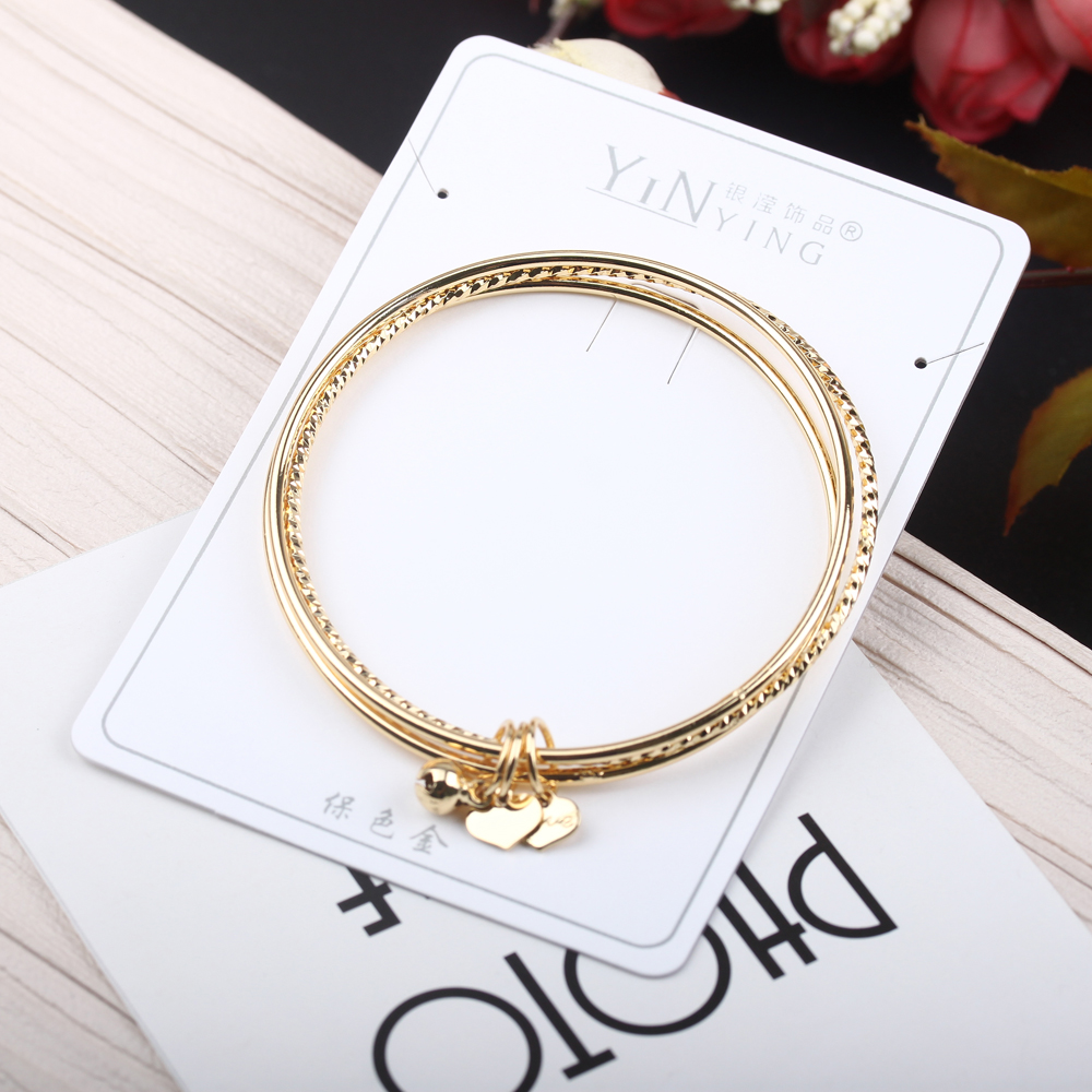 The boutique jewelry store features a gold bracelet from Nansha, a "Three Lives, Three Worlds" bell, a 24k gold simulation, and a best-selling gold-plated jewelry Specification image