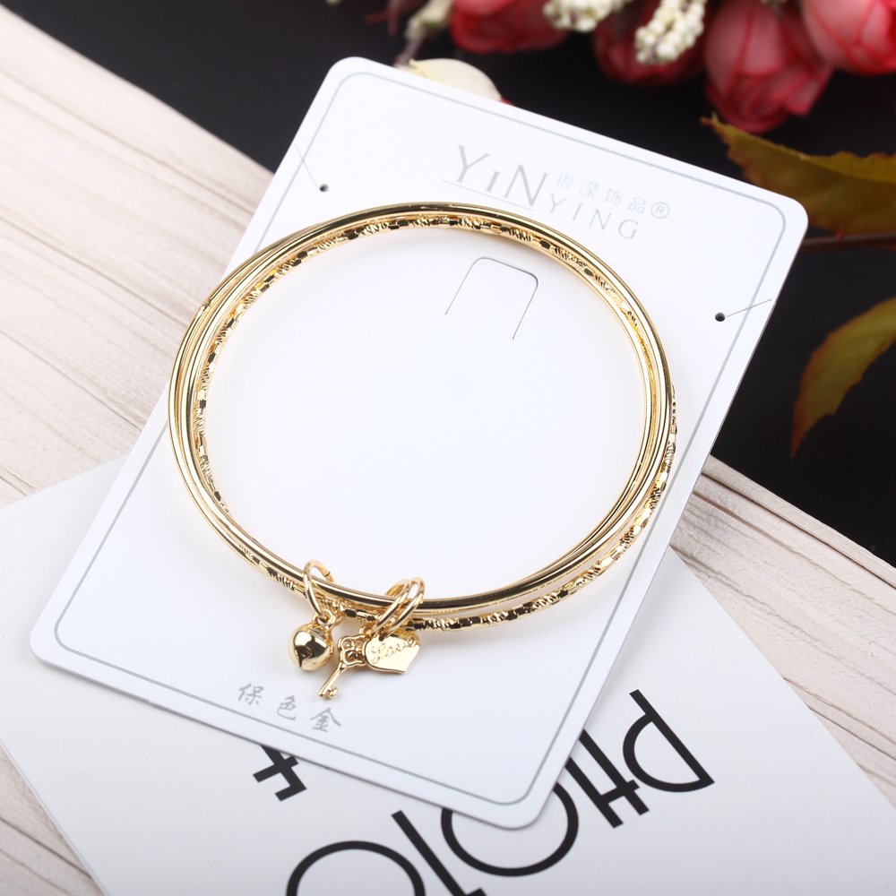 The boutique jewelry store features a gold bracelet from Nansha, a "Three Lives, Three Worlds" bell, a 24k gold simulation, and a best-selling gold-plated jewelry details Picture