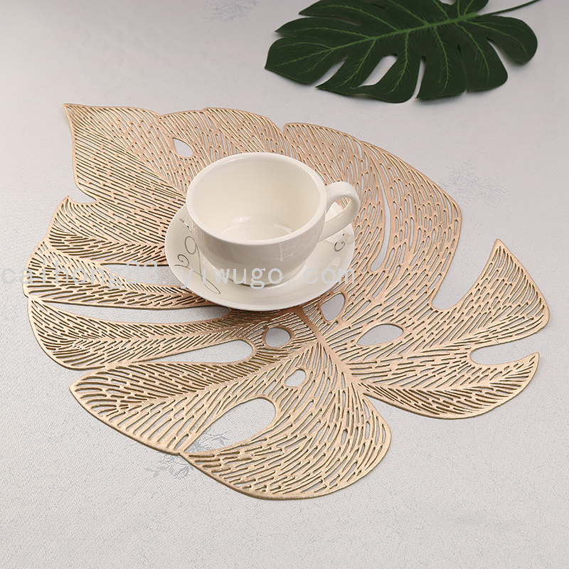 Customized wholesale of creative pvc turtle-back leaf hollowed-out pads, waterproof, oil-proof and heat-insulating Western placemats, wedding table decorations details Picture