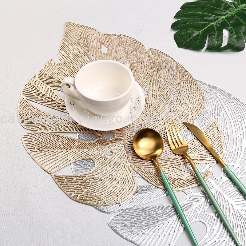 Customized wholesale of creative pvc turtle-back leaf hollowed-out pads, waterproof, oil-proof and heat-insulating Western placemats, wedding table decorations full figure