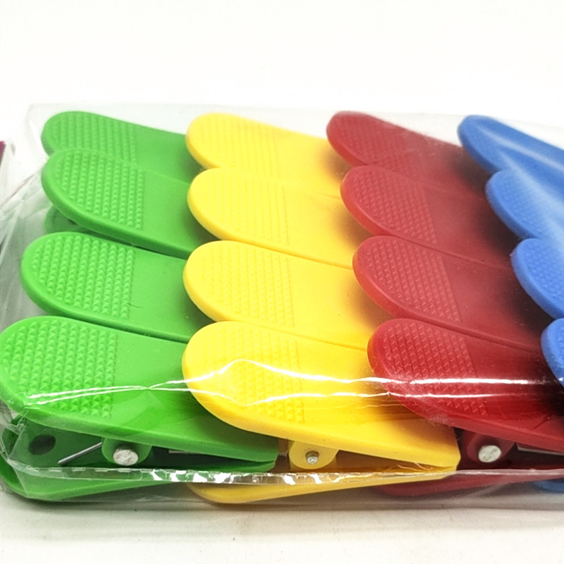 Sunshine Department Store bagged colorful plastic clips, household clothes-drying clips, windproof 4-color mixed set, 16-piece solid color clips details Picture