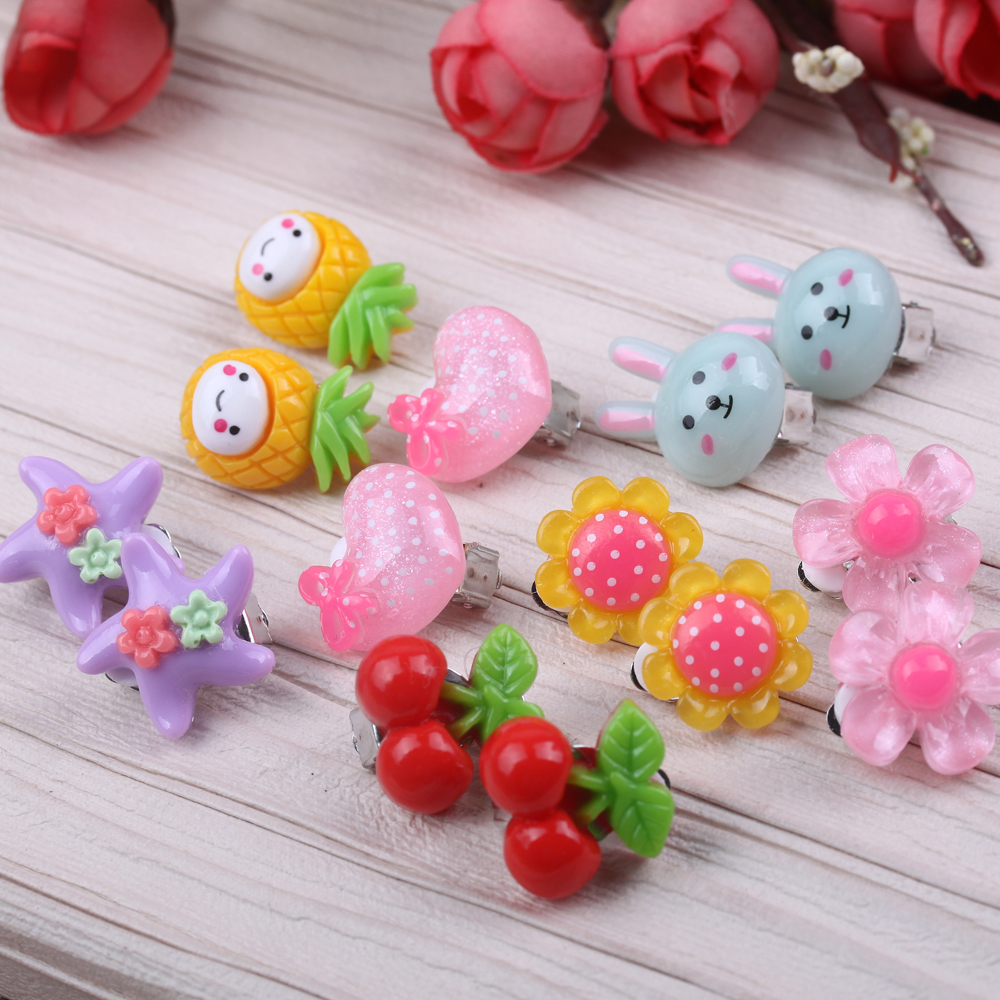 Yiwu jewelry wholesale children's earrings, ear clips, no ear holes, princess little girls, cute flowers, anti-pain ear studs Item Picture