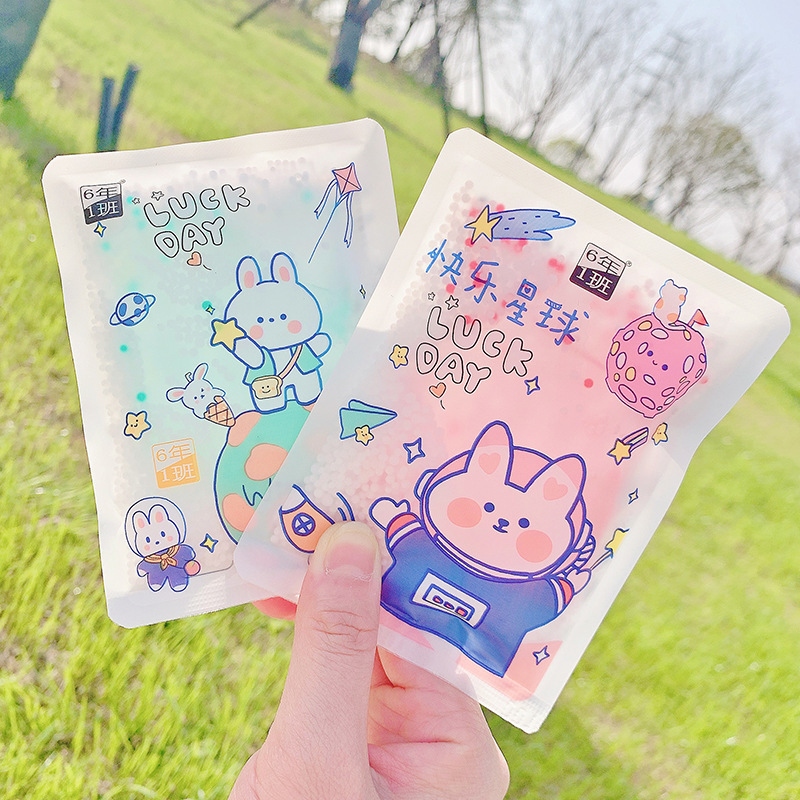 Students reuse ice packs for summer cooling. Tap the ice bags. Musicians squeeze the ice. Cartoon and cute. The ice packs are cool details Picture