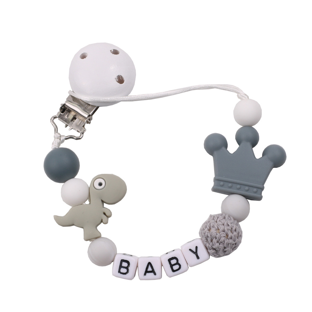 Amazon baby pacipacin clip cadena dental adhesivo cadena anti-caída dinosaurio pequeño cuentas de silicona cadena de chupete productos para bebés