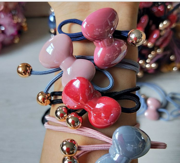 Yiwu premium leather band hair rope, bow, Korean-style colored hair rope, one or two yuan wholesale supply