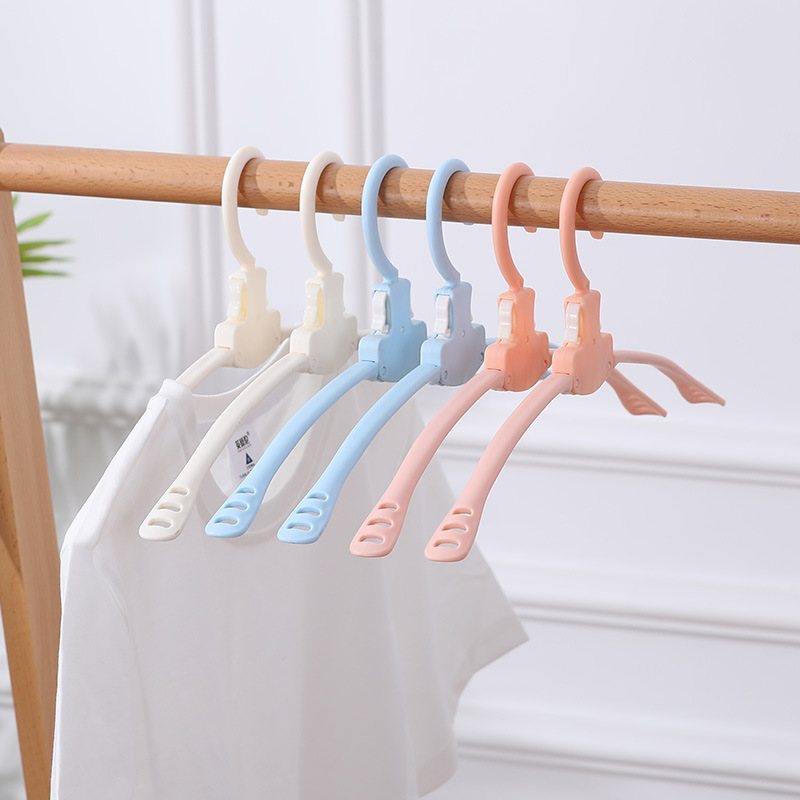Anti-slip magic plastic foldable clothes rack for travel and business trips, portable travel clothes drying rack and hanging clothes hanger Application Scenario