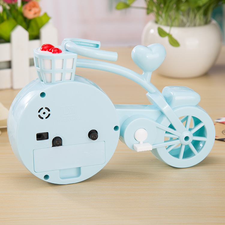Korean candy-colored bicycle alarm clock, creative student gifts, handicrafts, ornaments, digital alarm clock for study and bedroom Application Scenario