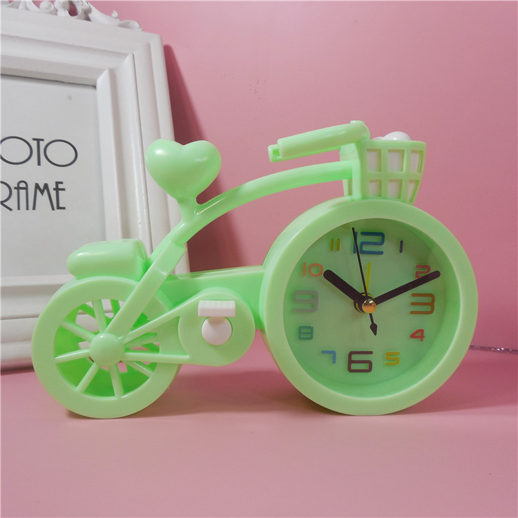 Creative bicycle alarm clock, cartoon desktop small alarm clock model alarm clock, children's clock, student gift and promotional items Application Scenario