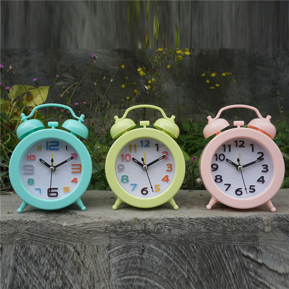 Candy-colored spherical double-bell alarm clock, fashionable clock, three-dimensional digital table clock, fashionable and modern lazy person clock full figure