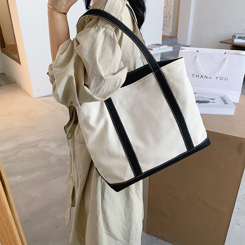 包包2021新款韩版时尚单肩包潮流通勤大容量女包帆布包ins手提包图