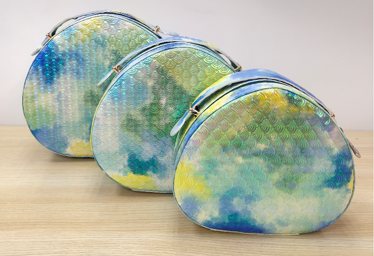 Adiva's new large-capacity three-piece set of cosmetic portable travel storage waterproof toiletry bag with painted fish scale pattern