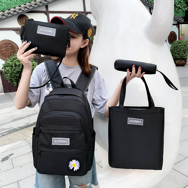 Four-piece schoolbag set for middle school girls, canvas backpack for junior high school students, 2020 new Korean version, high school campus trend details Picture