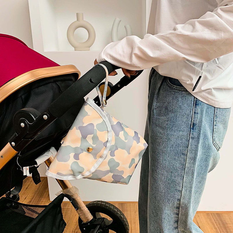 Cross-border manufacturers printed waterproof diaper bag Baby diaper storage bag Portable mommy diaper bag can be customized