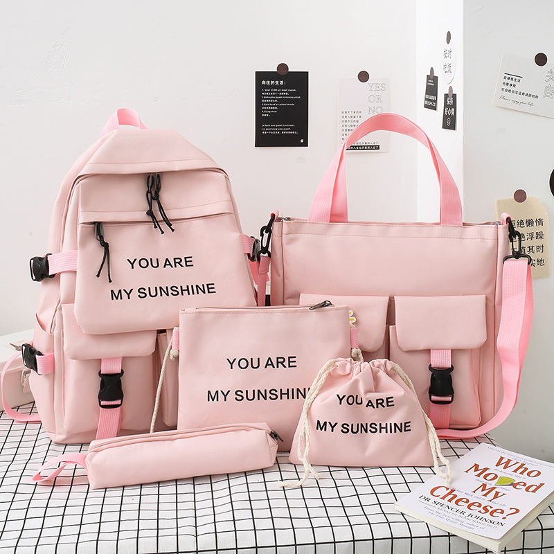 2020 new middle school backpack Korean version of high school junior high school backpack female large capacity couple travel backpack male