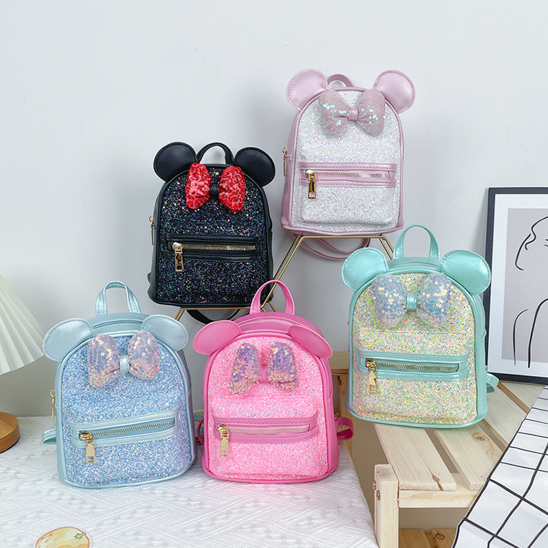 Fábrica de suministro directo nuevo estilo niños bolsa comercio exterior tendencia al por mayor lentejuelas arco orejas lindo pequeño mochila de la escuela