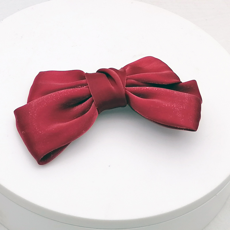 Wholesale of large A1015 bow tie clips, hairpins, hair clips, bangs clips, Japanese and Korean accessories at a 2-yuan store in Yiwu Application Scenario