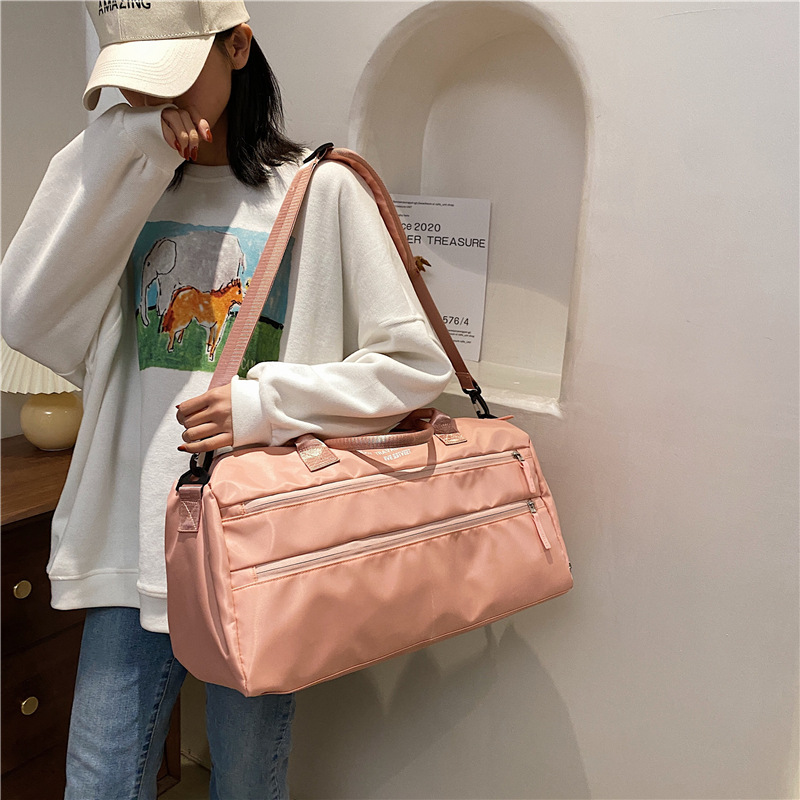 Lightweight short distance gym bag women dry wet separation large capacity gym training bag Individual shoe position cylinder sports bag