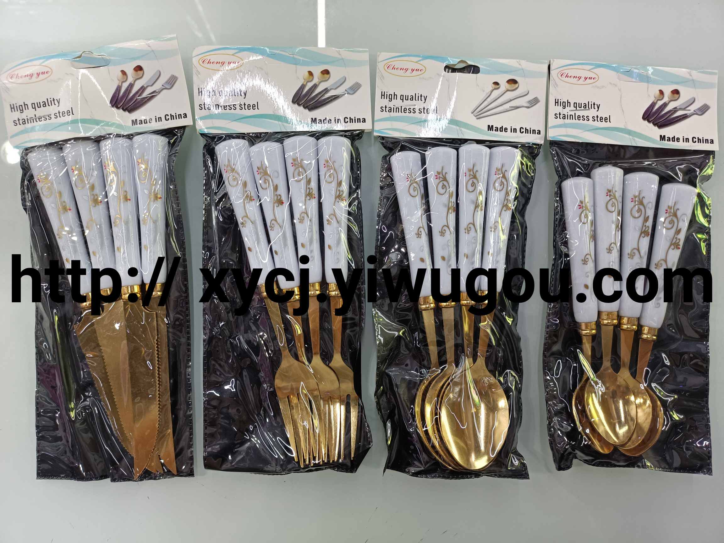 Stainless steel knives, forks and spoons, golden spoons, steak knives