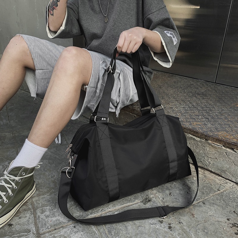Simple travel bag Large capacity travel bag hand purified color foldable duffle bag men's soft handle leisure fitness bag