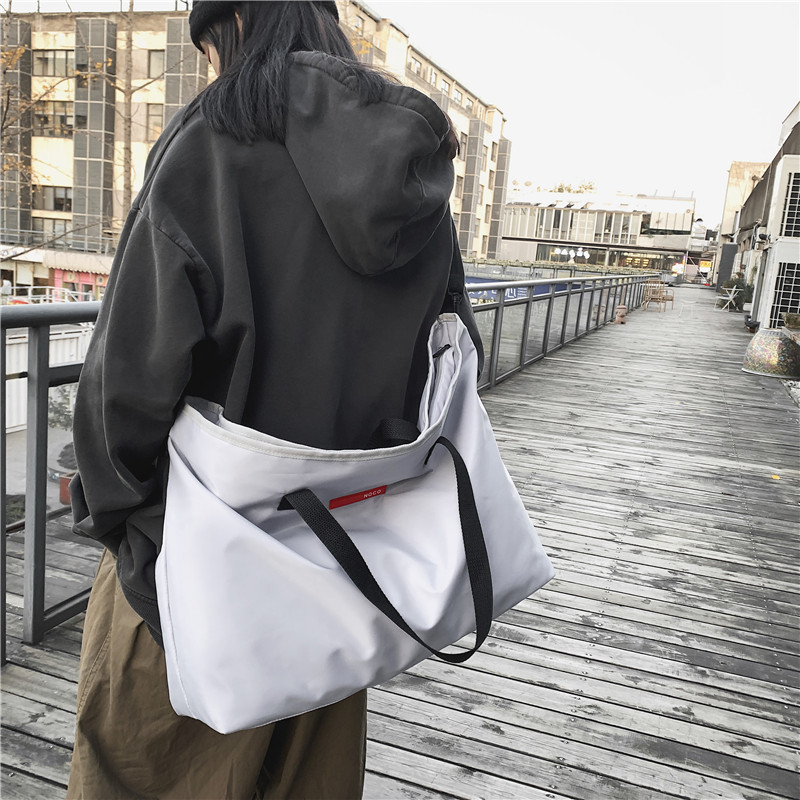 Short-distance travel bag, men's Korean-style lightweight handbag, women's business trip and travel large-capacity single-shoulder crossbody sports and fitness bag Specification image