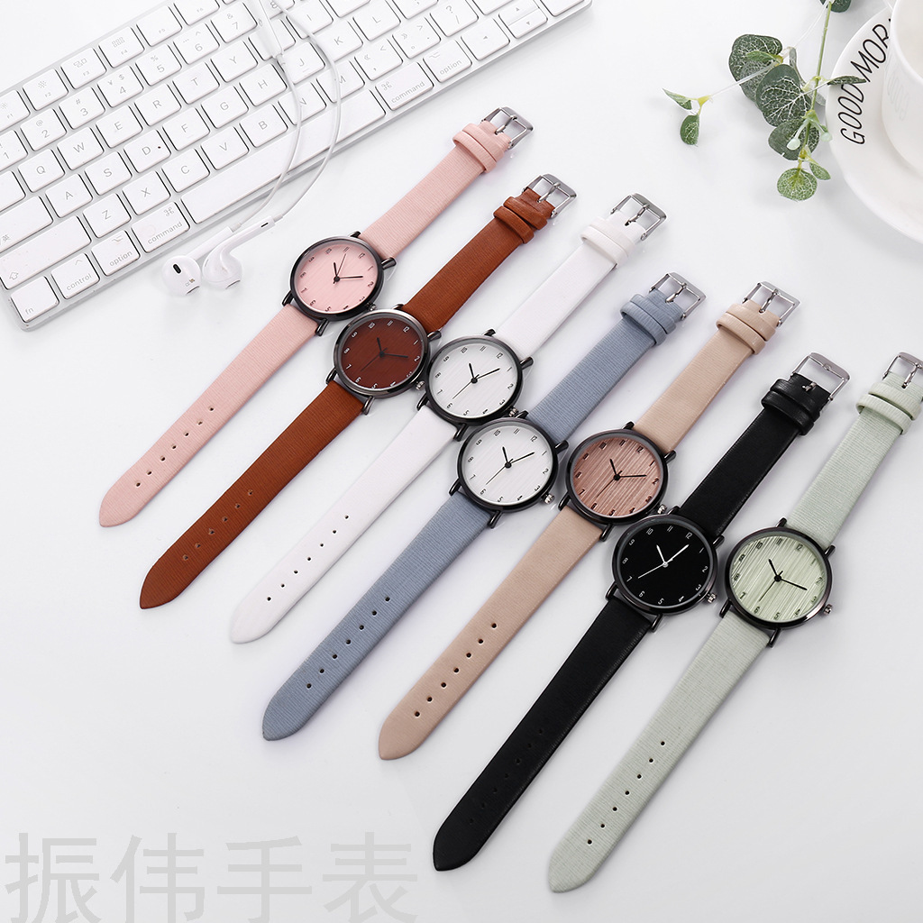 Factory direct sales of fashionable ultra-thin leather strap ladies' quartz watches. Simple small numbers, wood grain dial, versatile wristwatches Application Scenario