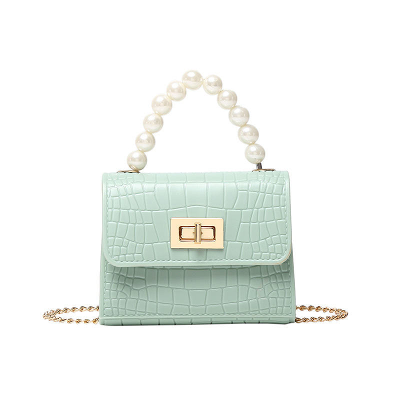 2021 Summer New PVC colorful mini jelly bag, pearl hand-held mini crossbody bag, cross-border women's bag Application Scenario