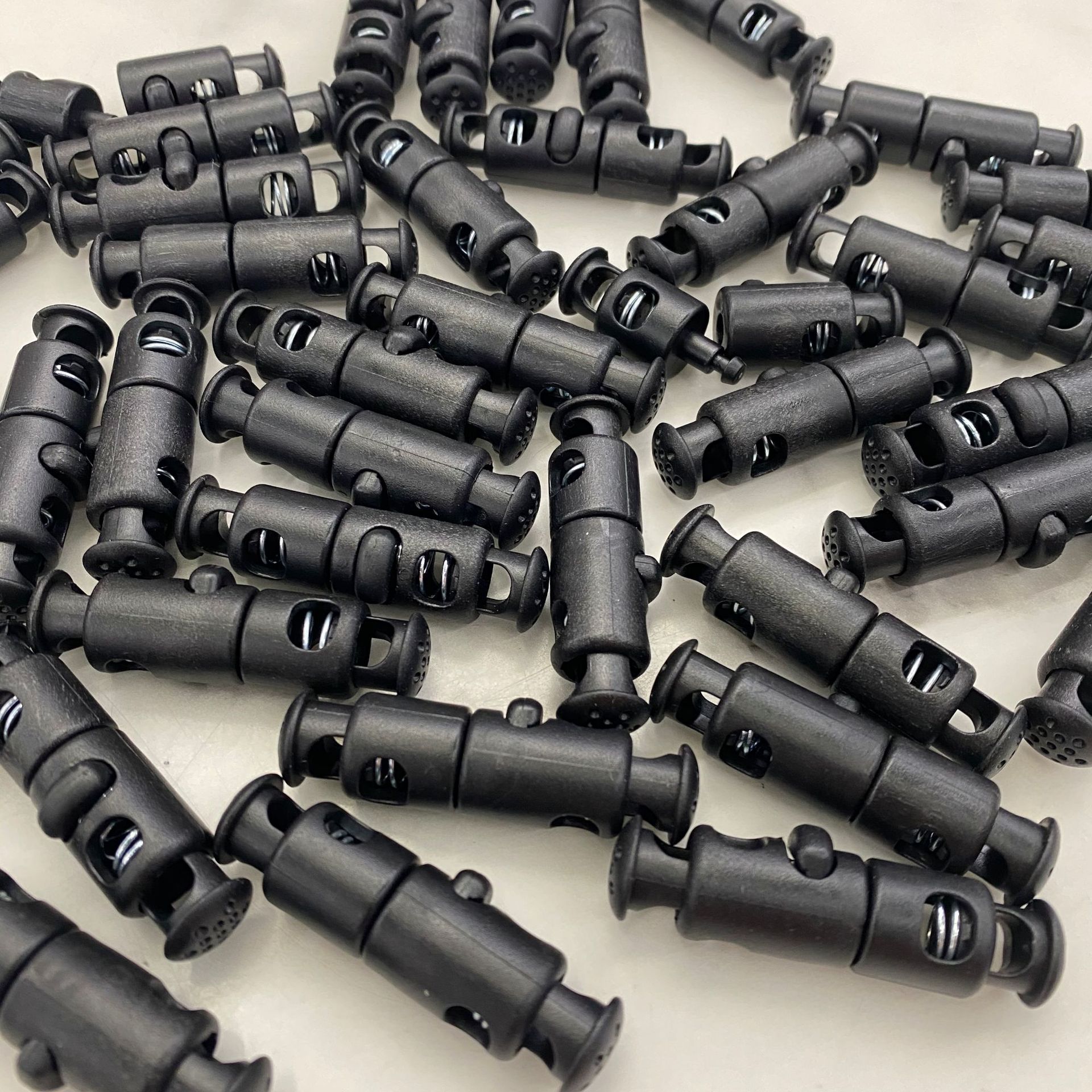 Plastic rope buckle, spring buckle, fixed buckle, adjusting buckle, double-hole cylindrical rod, rope buckle, elastic band, fixed snap buckle details Picture
