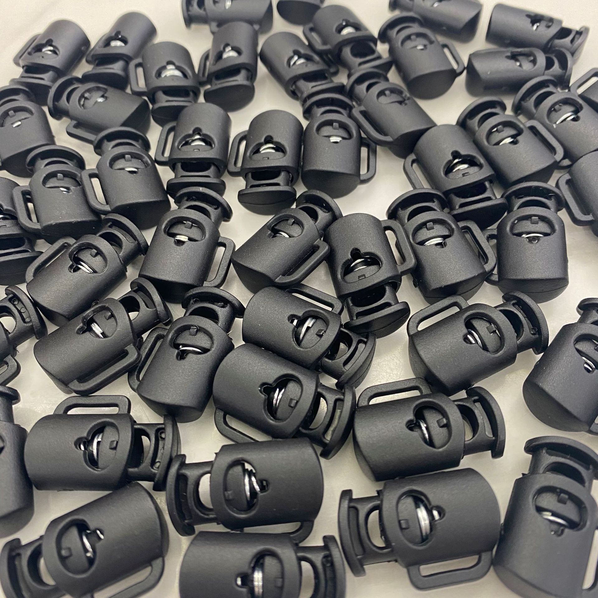 Plastic rope buckle, spring buckle, fixed buckle, adjusting buckle, double-hole cylindrical rod, rope buckle, elastic band, fixed snap buckle Specification image