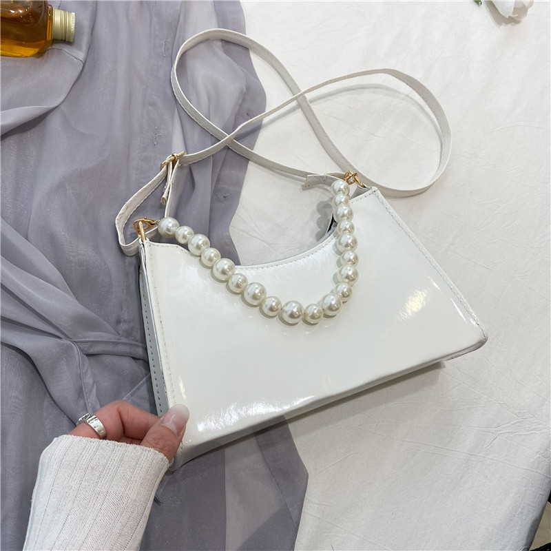 夏季小包白色珍珠包女2021新款潮质感腋下包法棍包单肩手提小方包