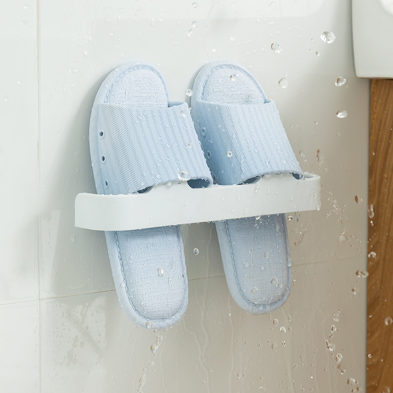 High-end bathroom powerful cat paw slipper storage wonder wall-mounted seamless slipper rack without perforation