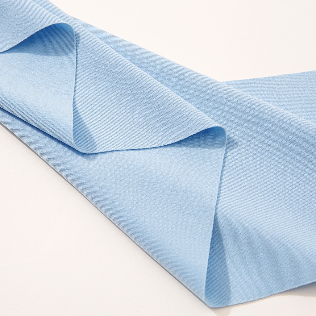Factory direct sales of 100D polyester spandex four-sided elastic tweed fleece fabric for fashionable men's and women's autumn and winter fashion pants Application Scenario