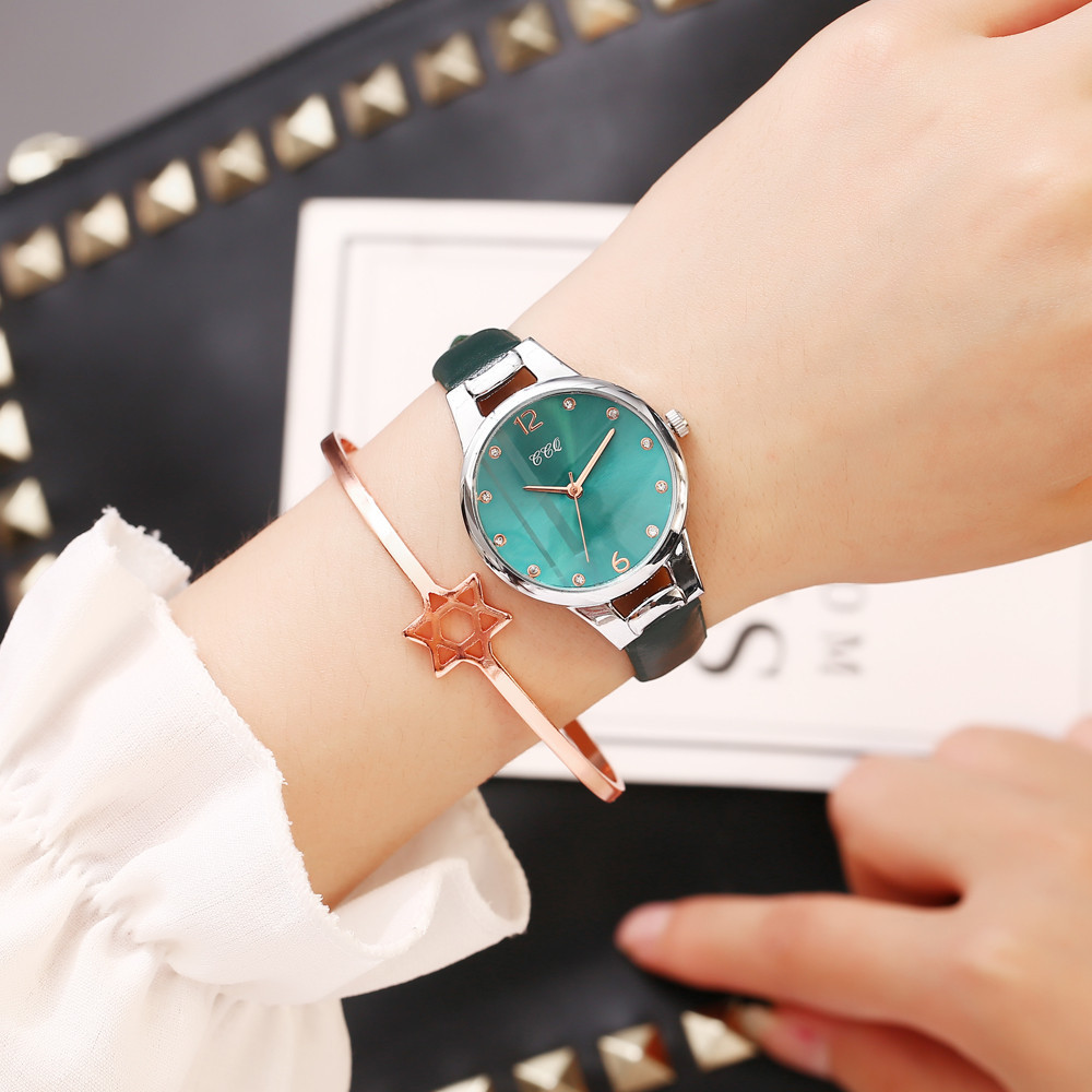 A popular foreign trade women's small leather strap striped dial watch with a fashionable round dial and diamond-dotted casual women's watch details Picture