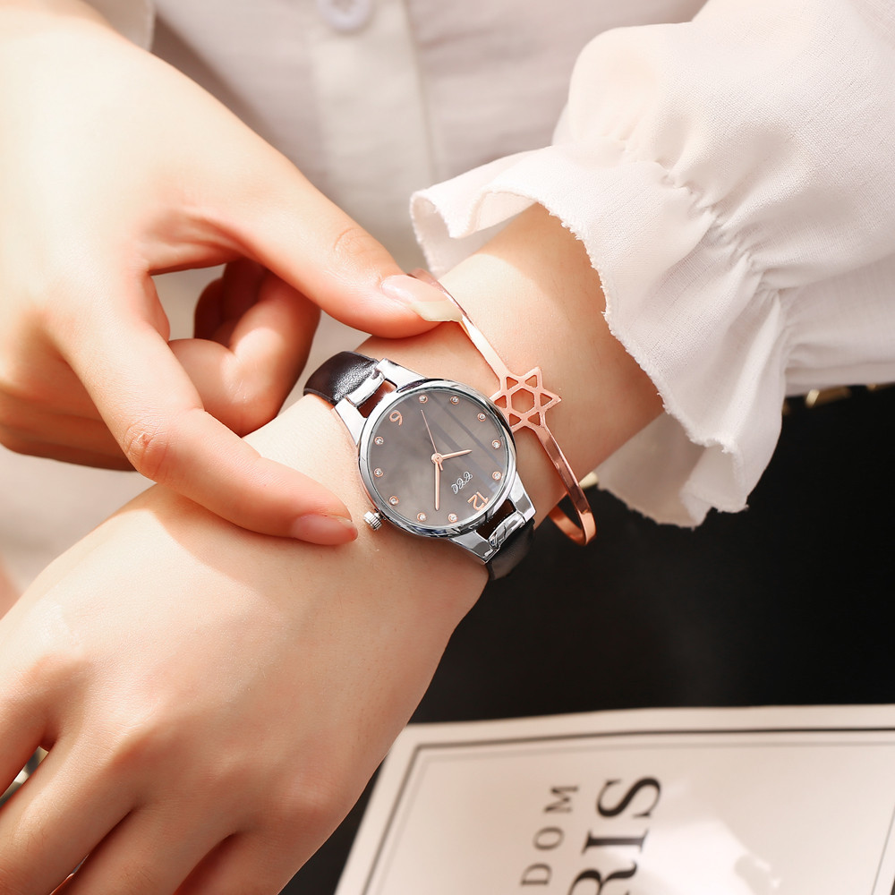 A popular foreign trade women's small leather strap striped dial watch with a fashionable round dial and diamond-dotted casual women's watch Item Picture