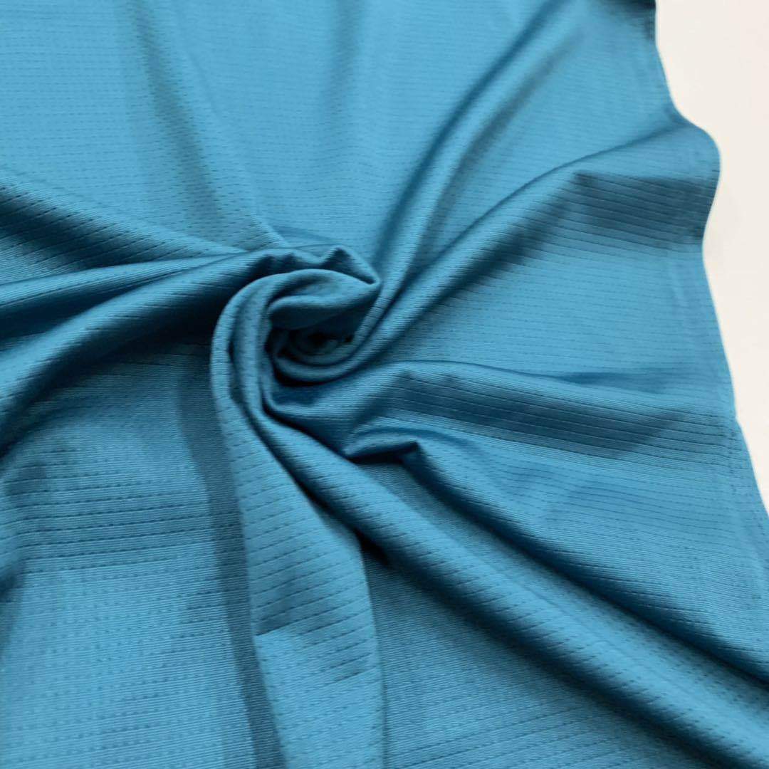 The manufacturer supplies knitted jacquard elastic bead weft woven polyester spandex mesh fabric
