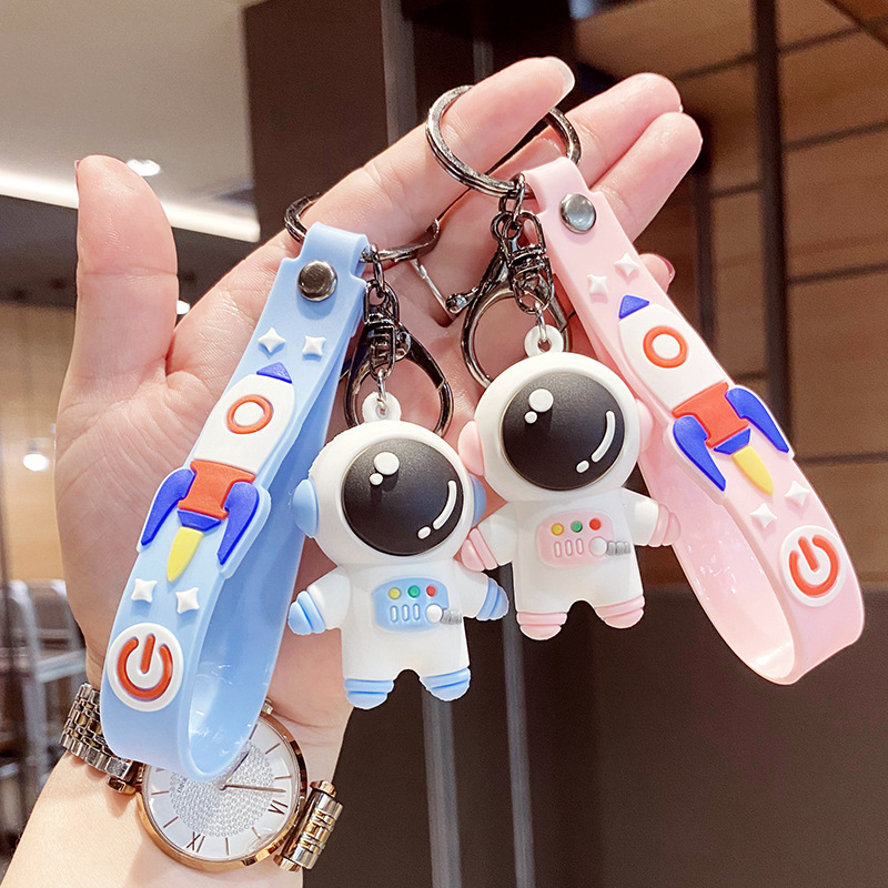 Cartoon astronaut key chain female cute Korean version couple key chain male soft glue small pendant key ring hanging ornaments