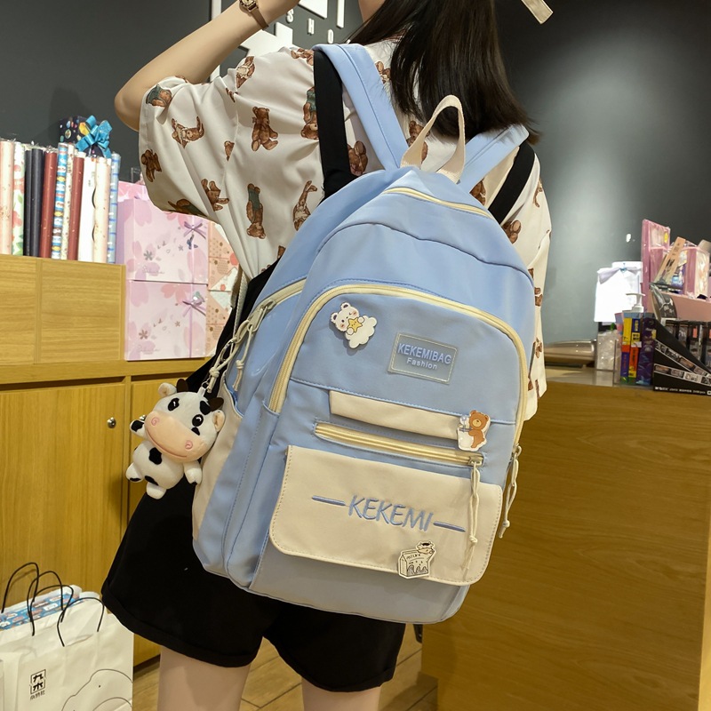 The new high-capacity ulzzang backpack for junior high school students in Korean high school color contrast is an ins backpack details Picture