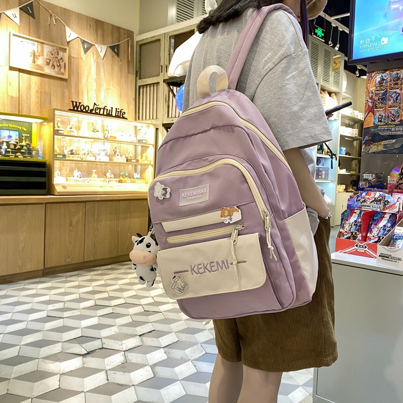 The new high-capacity ulzzang backpack for junior high school students in Korean high school color contrast is an ins backpack Specification image