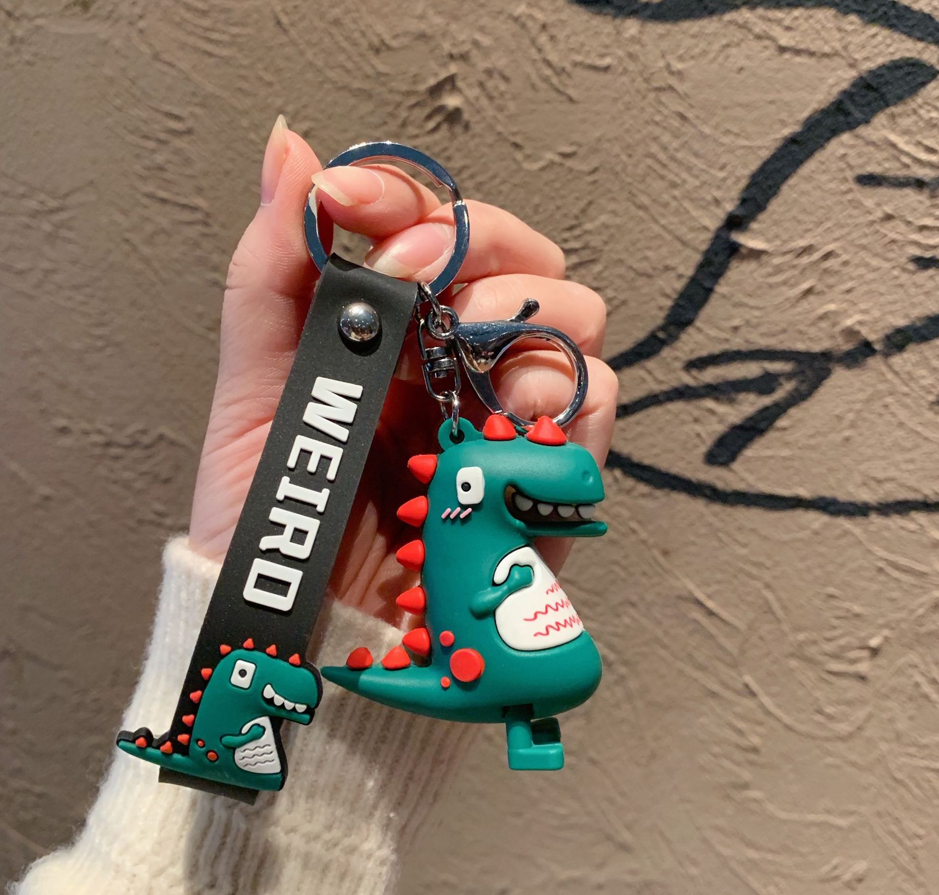 Creative, cute and simple cartoon dinosaur keychains, women's car bags, pendants, key chains, street stall products wholesale