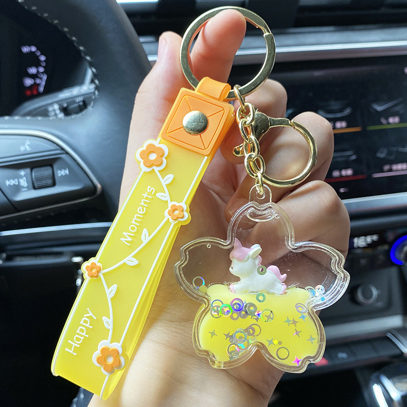 Cherry blossom oil unicorn keychain, liquid flowing sand floating key chain ring, Internet celebrity cute and exquisite pendant wholesale Specification image