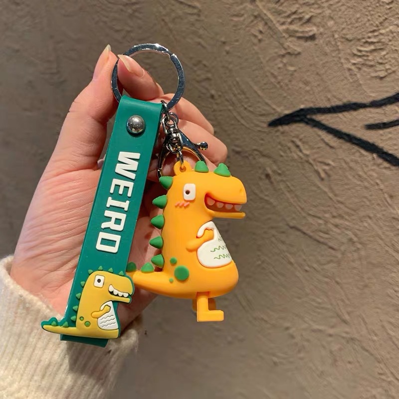 Creative, cute and simple cartoon dinosaur keychains, women's car bags, pendants, key chains, street stall products wholesale Application Scenario