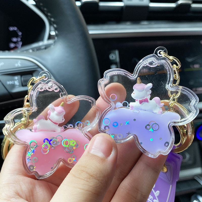 Cherry blossom oil unicorn keychain, liquid flowing sand floating key chain ring, Internet celebrity cute and exquisite pendant wholesale Application Scenario