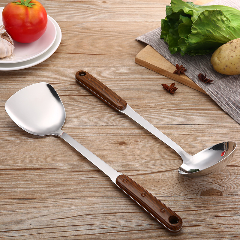 Chaosheng Hardware 201 Non-magnetic Stainless Steel 3-millimeter plastic handle wood-grain imitation cooking spatula, soup spoon and kitchenware set Item Picture