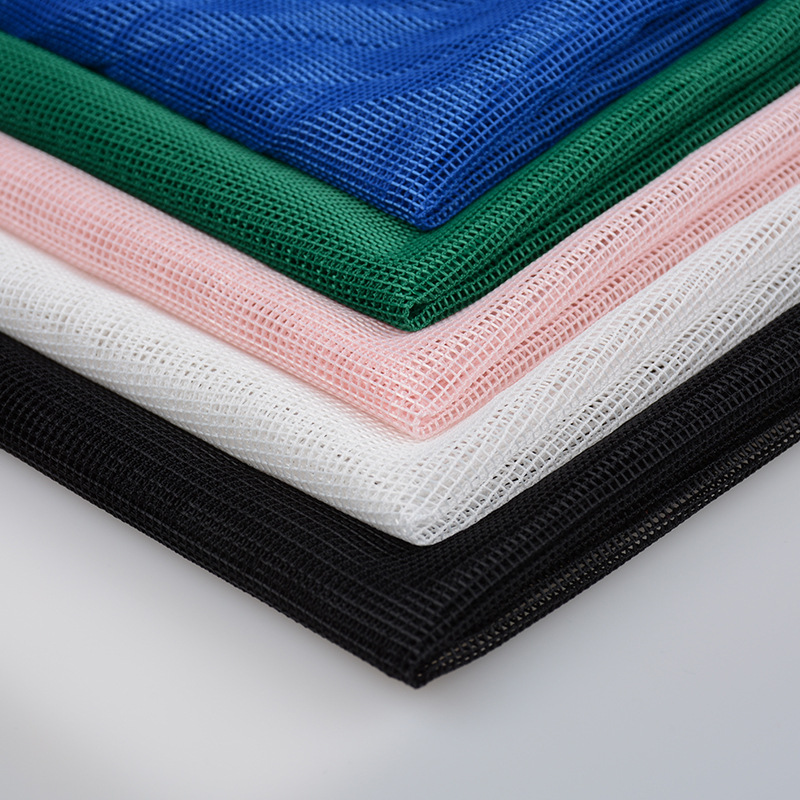 We produce and wholesale diamond-shaped hard grid low-elasticity square hard mesh fabric, polyester four-corner hats, handbags, cosmetic bags and mesh fabric details Picture