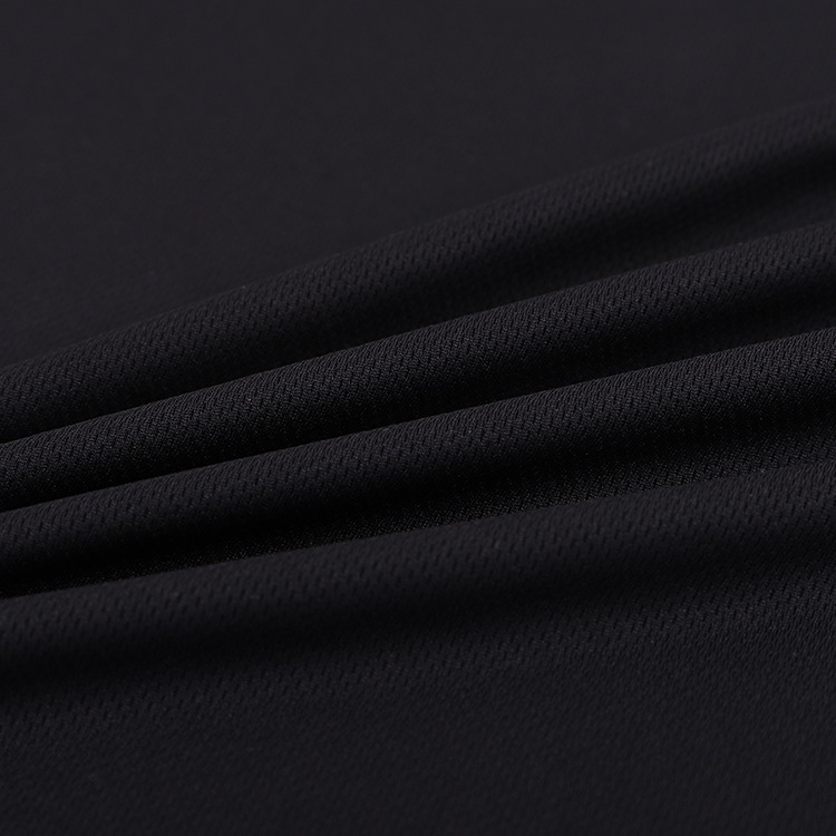 Factory stock: 130-140g full polyester moisture-absorbing bird's eye mesh fabric, full polyester sports T-shirt fabric, knitted bird's eye fabric Application Scenario