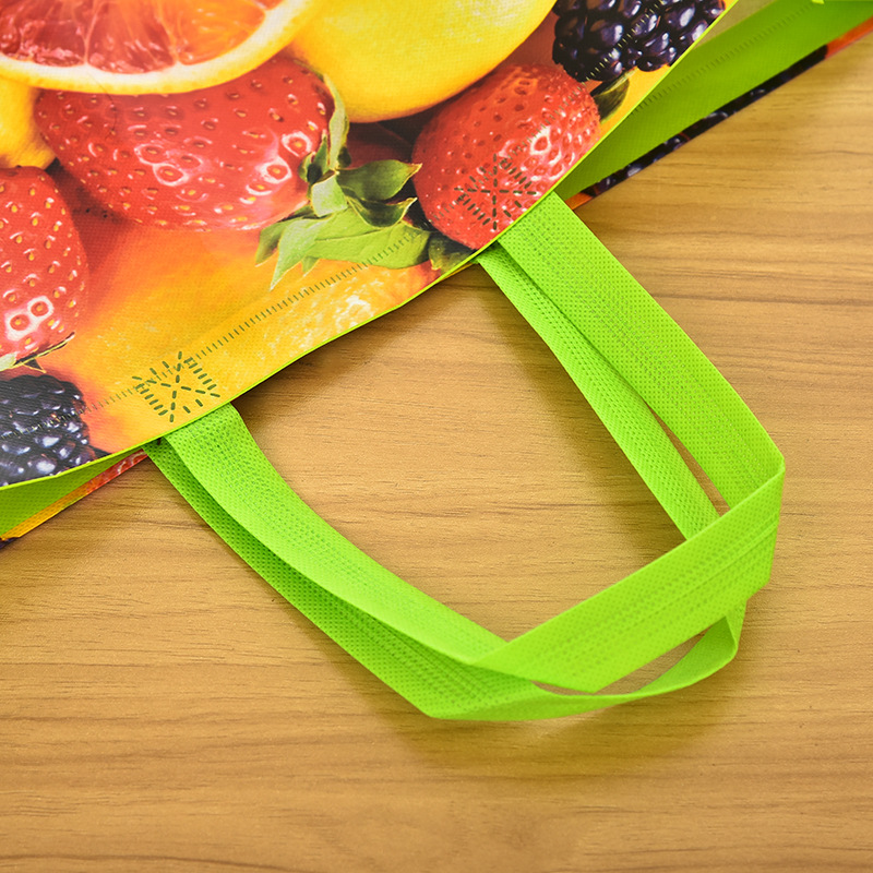 Fabricante bolsa de frutas no tejida bolsa de compras ropa bolsa de almacenamiento tejido impresión a color embalaje laminado bolsa de transporte en stock Specification image