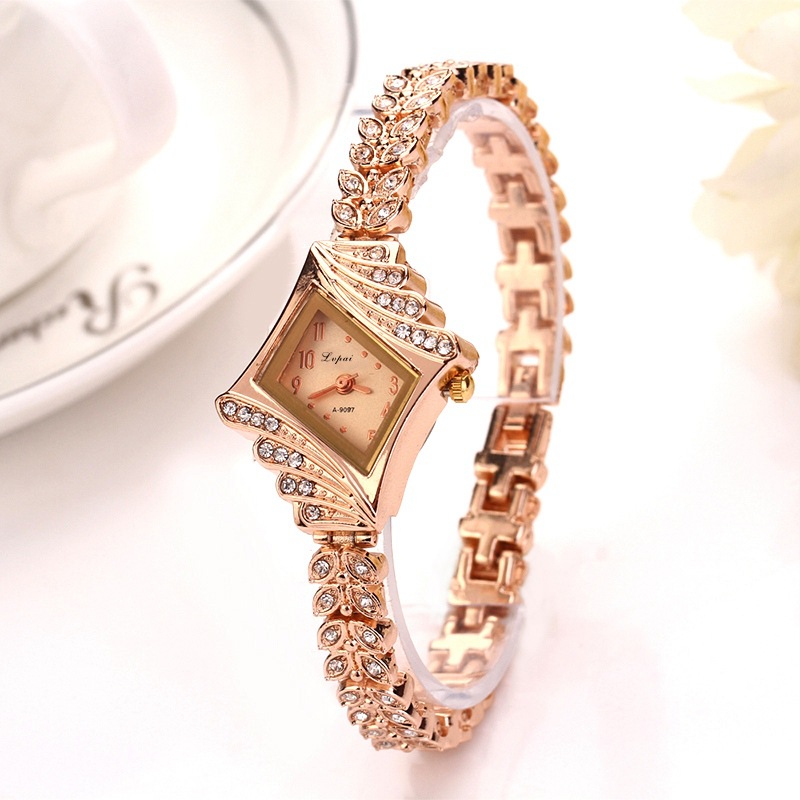 The women's diamond-encrusted bracelet watch brand features a popular diamond-shaped dial alloy bracelet watch