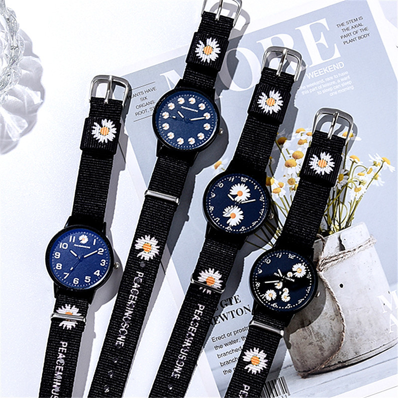 Reloj de cristal azul pequeña daisy reloj ins viento estudiante reloj de moda canvas pareja girlfriends crisantemos reloj de pulsera