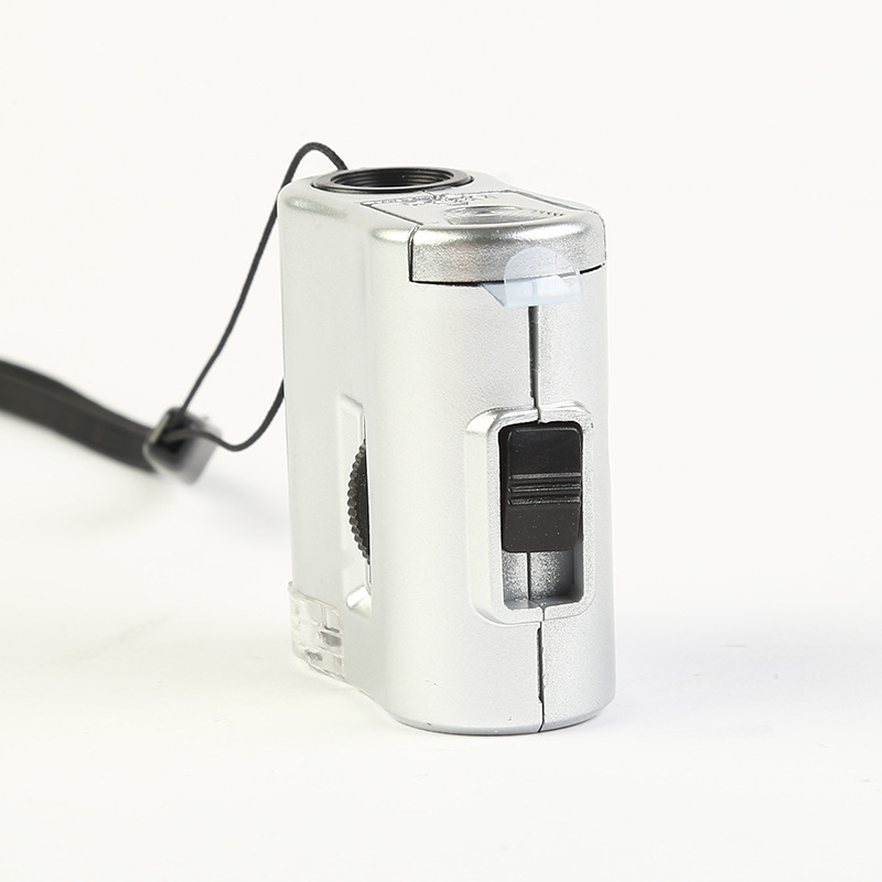 The new 9592 microscope, with a 60x magnifying glass and a lamp, is a multi-functional magnifying glass for banknote and jewelry inspection, custom-made by the manufacturer Specification image