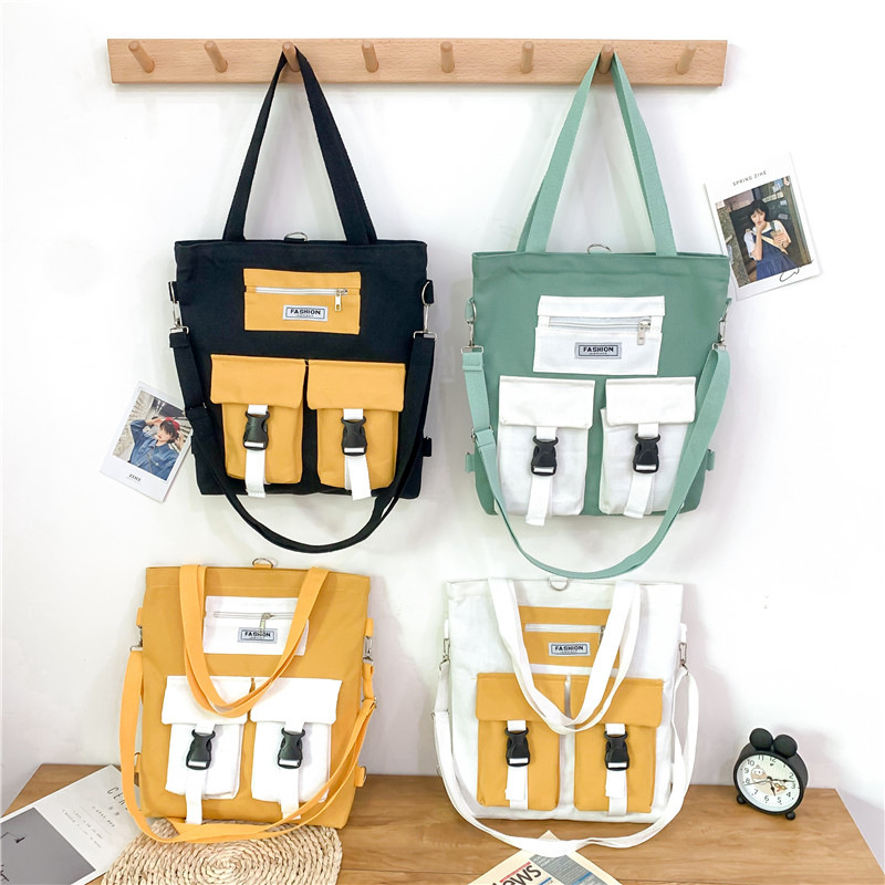 2021 new single-shoulder oblique straddle double back large capacity student make-up canvas bag double pocket mobile phone change bag women's bag